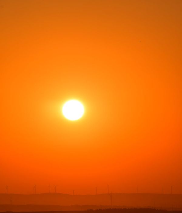 Renewable energy landscape with solar panels and wind turbines across Kazakhstan steppe